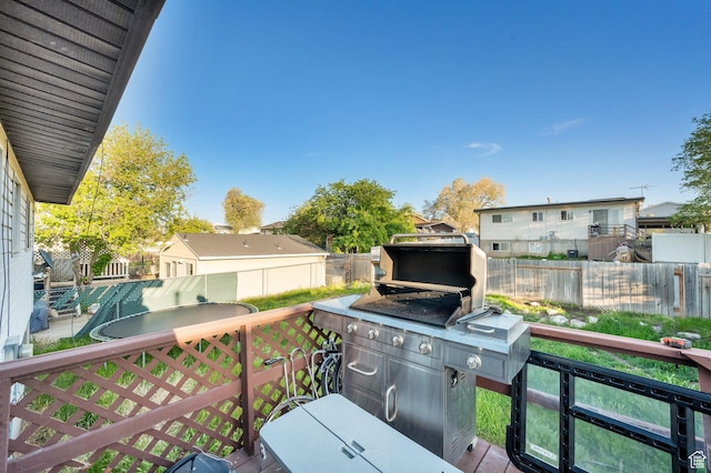 7979 W 3320 S, Magna, UT 84044 - wooden terrace featuring a fenced backyard and a residential view