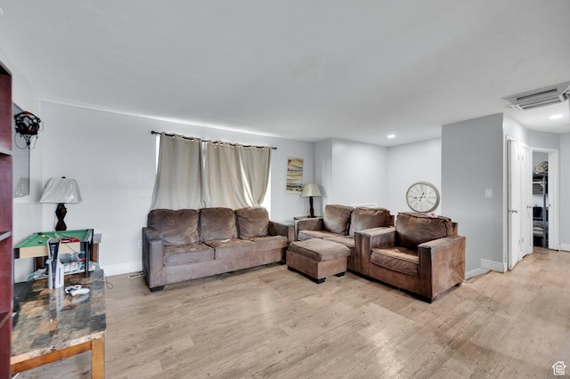 7979 W 3320 S, Magna, UT 84044 - living area featuring recessed lighting, baseboards, visible vents, and light wood-style floors