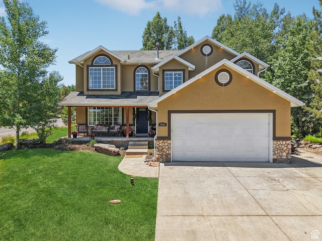 8030 N Springshire Dr, Park City, UT 84098 - traditional-style home with stucco siding, stone siding, driveway, a porch, and a front yard