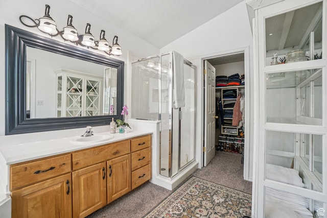 8030 N Springshire Dr, Park City, UT 84098 - bathroom featuring a stall shower, vanity, and a walk in closet