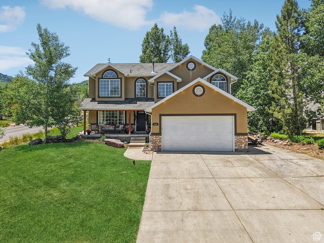 8030 N Springshire Dr, Park City, UT 84098 - traditional-style house with a porch, stucco siding, stone siding, driveway, and a front lawn