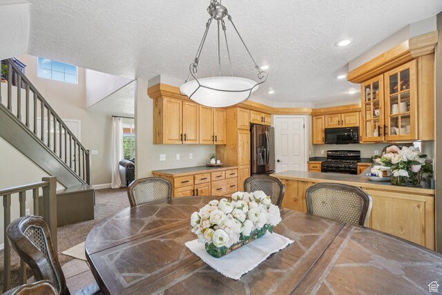 8030 N Springshire Dr, Park City, UT 84098 - carpeted dining area with a textured ceiling, stairs, and recessed lighting