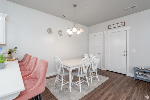 1809 W Terra Vista Ln Unit H101, Saratoga Springs, UT 84045 - dining space featuring baseboards, visible vents, dark wood-style floors, and an inviting chandelier