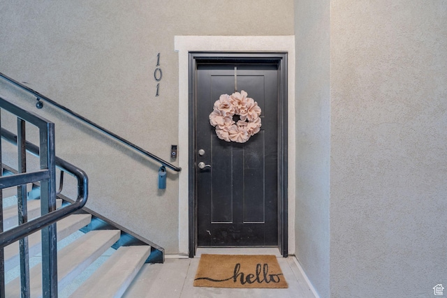 1809 W Terra Vista Ln Unit H101, Saratoga Springs, UT 84045 - doorway to property with stucco siding