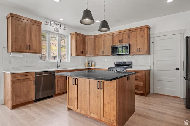 833 S 260 E, Willard, UT 84340 - kitchen featuring recessed lighting, light wood-style flooring, tasteful backsplash, and stainless steel appliances