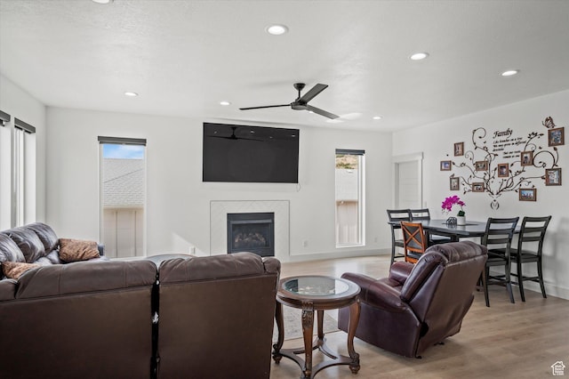833 S 260 E, Willard, UT 84340 - living room with recessed lighting, light wood finished floors, ceiling fan, and a fireplace