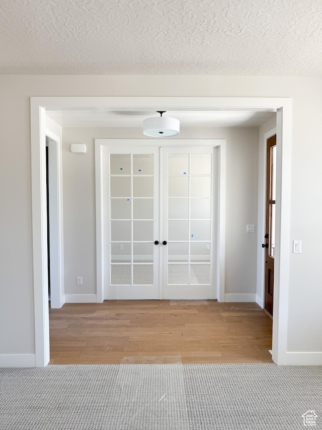 302 W Horizon View Loop Unit 35, Elk Ridge, UT 84651 - foyer entrance featuring baseboards, light wood-type flooring, and a textured ceiling