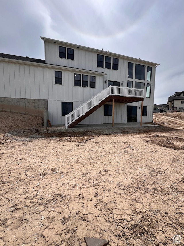 302 W Horizon View Loop Unit 35, Elk Ridge, UT 84651 - back of property featuring stairs and a deck