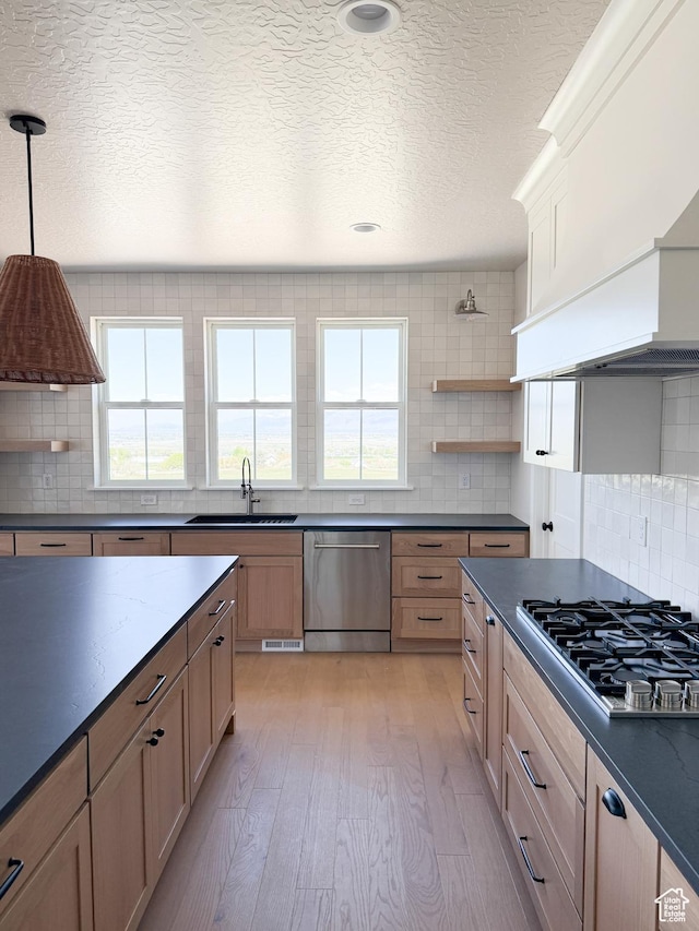 302 W Horizon View Loop Unit 35, Elk Ridge, UT 84651 - kitchen with gas cooktop, dark countertops, tasteful backsplash, and stainless steel dishwasher