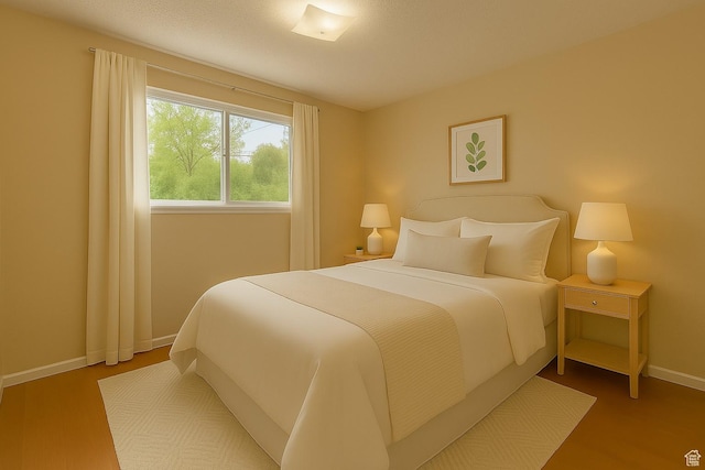 326 E 150 S, Kanab, UT 84741 - bedroom featuring baseboards and wood finished floors