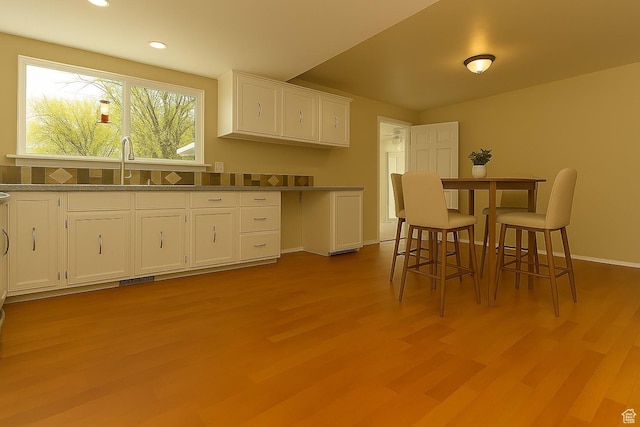 326 E 150 S, Kanab, UT 84741 - kitchen featuring white cabinets, wood finished floors, and recessed lighting