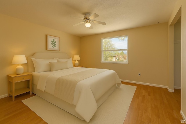 326 E 150 S, Kanab, UT 84741 - bedroom with light wood finished floors and a ceiling fan