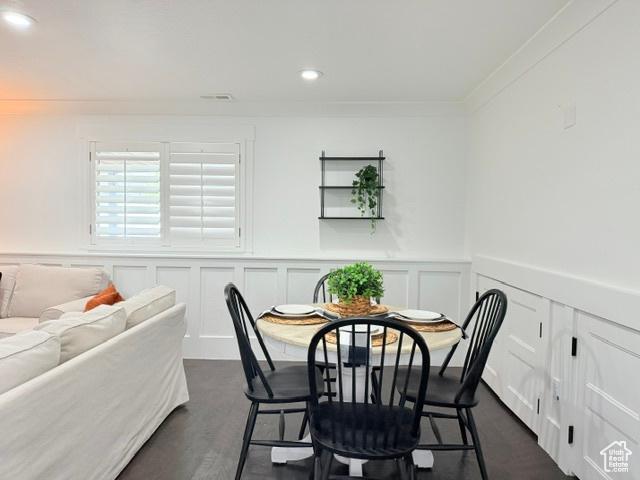 1170 N Main St, Orem, UT 84057 - dining space featuring recessed lighting, a decorative wall, wainscoting, and ornamental molding