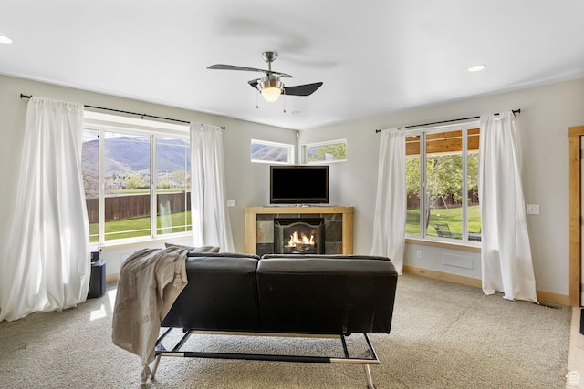 933 N Swiss Farm Ct, Midway, UT 84049 - carpeted living area featuring a ceiling fan, recessed lighting, a wealth of natural light, and a tile fireplace