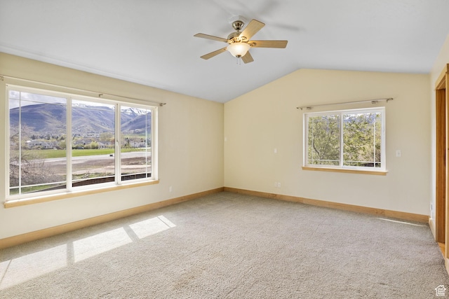 933 N Swiss Farm Ct, Midway, UT 84049 - spare room featuring baseboards, carpet flooring, ceiling fan, and vaulted ceiling