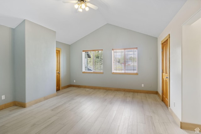 933 N Swiss Farm Ct, Midway, UT 84049 - spare room featuring light wood-style floors, baseboards, a ceiling fan, and lofted ceiling