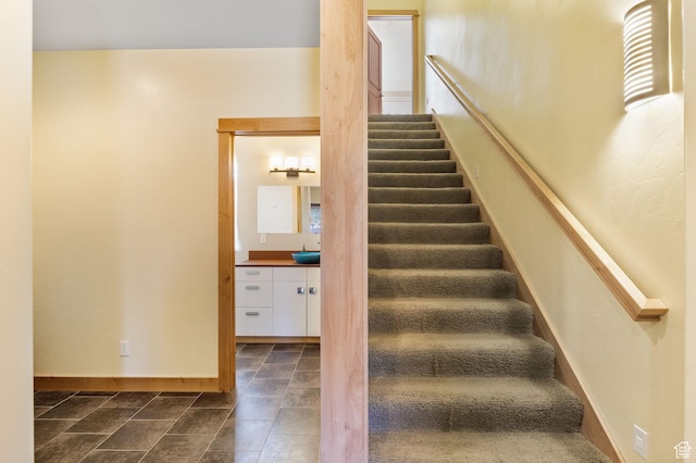 933 N Swiss Farm Ct, Midway, UT 84049 - staircase featuring baseboards