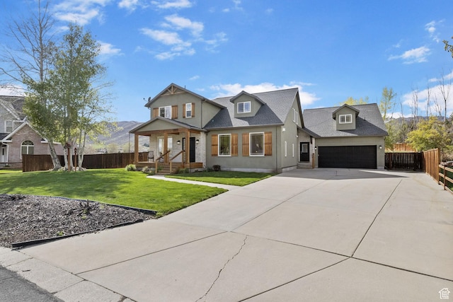 933 N Swiss Farm Ct, Midway, UT 84049 - modern inspired farmhouse featuring fence, a front lawn, a garage, a porch, and driveway