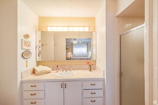 1597 E 8900 S, Paradise, UT 84328 - ensuite bathroom with a shower stall, vanity, and ceiling fan