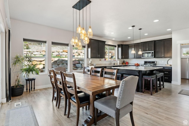 4852 N Arctic Fox Cir W Unit 2800, Lehi, UT 84043 - dining space with light wood-style floors, recessed lighting, baseboards, and visible vents