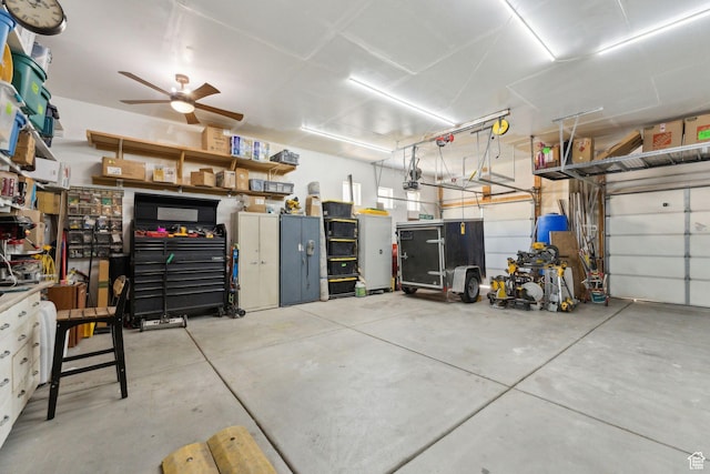 4852 N Arctic Fox Cir W Unit 2800, Lehi, UT 84043 - garage with ceiling fan and a garage door opener