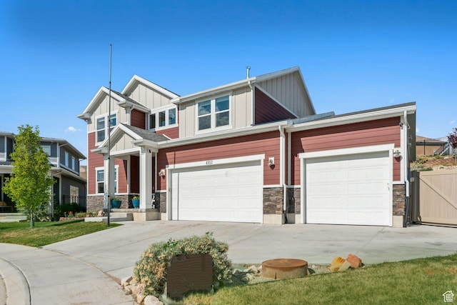 4852 N Arctic Fox Cir W Unit 2800, Lehi, UT 84043 - craftsman inspired home featuring board and batten siding, concrete driveway, and stone siding