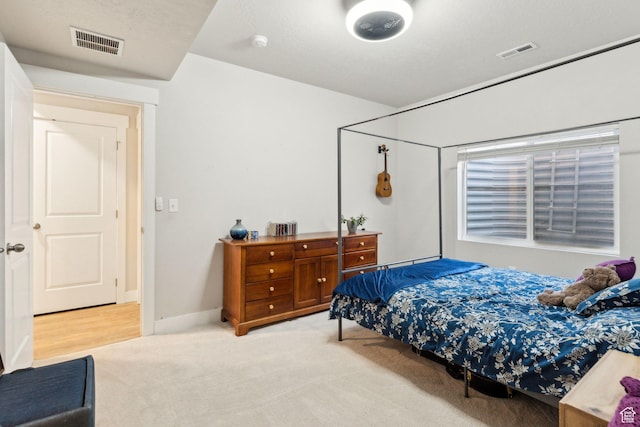 4852 N Arctic Fox Cir W Unit 2800, Lehi, UT 84043 - bedroom featuring light carpet and visible vents