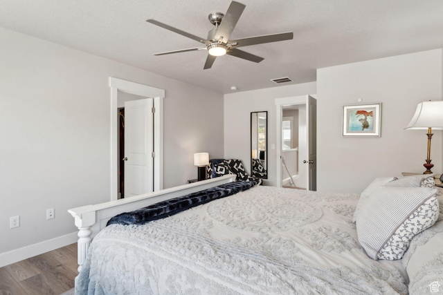 4852 N Arctic Fox Cir W Unit 2800, Lehi, UT 84043 - bedroom featuring baseboards, a ceiling fan, wood finished floors, and visible vents