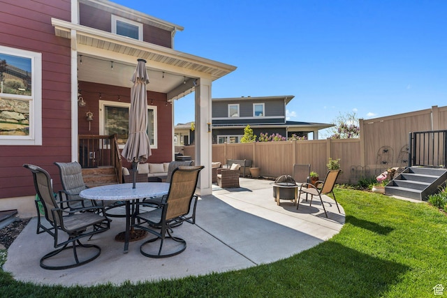 4852 N Arctic Fox Cir W Unit 2800, Lehi, UT 84043 - view of patio featuring an outdoor living space with a fire pit and fence