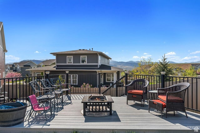 4852 N Arctic Fox Cir W Unit 2800, Lehi, UT 84043 - wooden deck with a mountain view and an outdoor fire pit