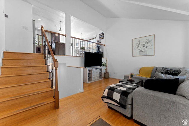 3429 W Beckford Cir, West Jordan, UT 84088 - living room featuring wood finished floors and stairway