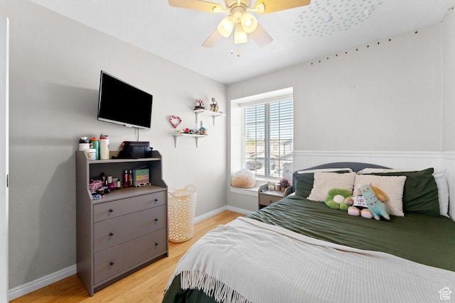 3429 W Beckford Cir, West Jordan, UT 84088 - bedroom featuring baseboards, ceiling fan, and light wood finished floors