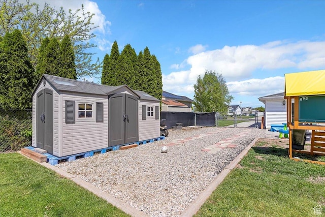 2437 W 2375 N, Clinton, UT 84015 - view of shed featuring a fenced backyard