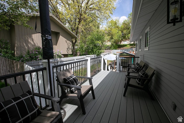 5716 S Maplewood Dr E, South Ogden, UT 84405 - wooden terrace featuring a fenced backyard