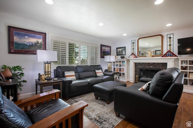 5716 S Maplewood Dr E, South Ogden, UT 84405 - living room featuring recessed lighting, baseboards, wood finished floors, and a fireplace