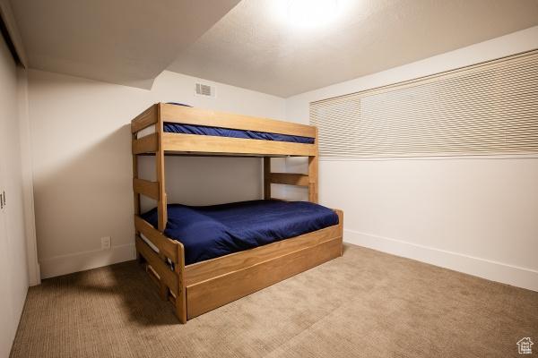 2812 E Commonwealth Ave S, Salt Lake City, UT 84109 - bedroom featuring visible vents, carpet, and baseboards