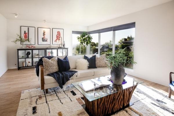 2812 E Commonwealth Ave S, Salt Lake City, UT 84109 - living area with baseboards and light wood-style flooring