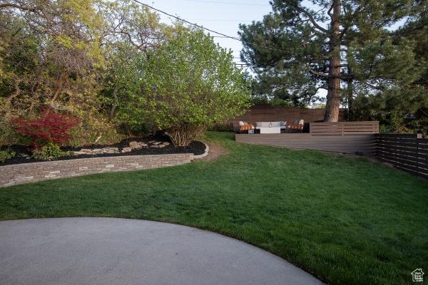 2812 E Commonwealth Ave S, Salt Lake City, UT 84109 - view of yard featuring fence and a patio area