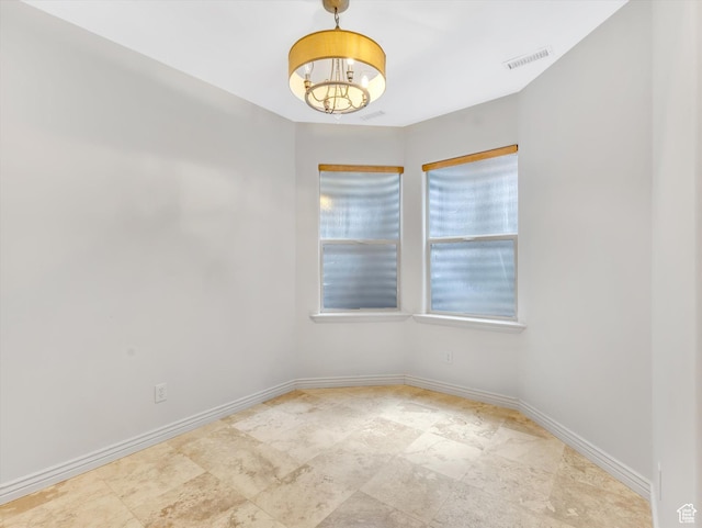 14099 S Pine Mesa Dr, Draper, UT 84020 - spare room featuring a notable chandelier, visible vents, and baseboards