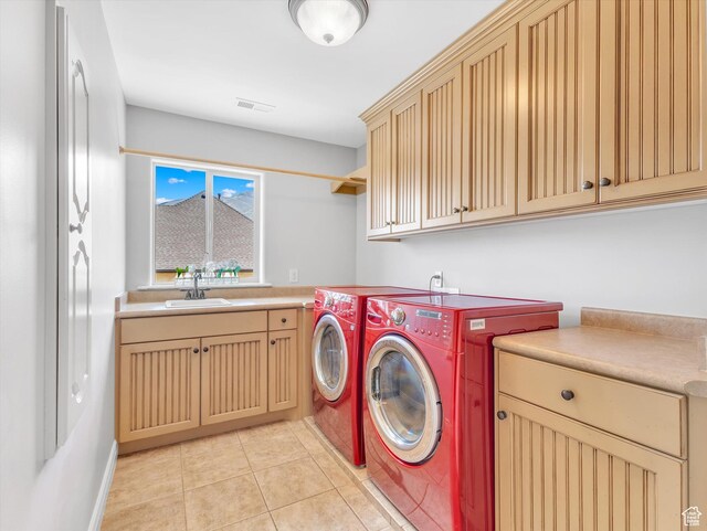 14099 S Pine Mesa Dr, Draper, UT 84020 - laundry area with cabinet space, a sink, light tile patterned floors, visible vents, and washer and clothes dryer