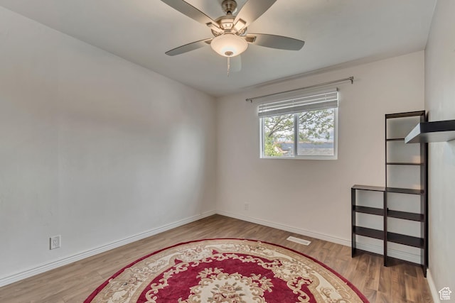 8729 S 3720 W, West Jordan, UT 84088 - empty room with baseboards, a ceiling fan, and wood finished floors