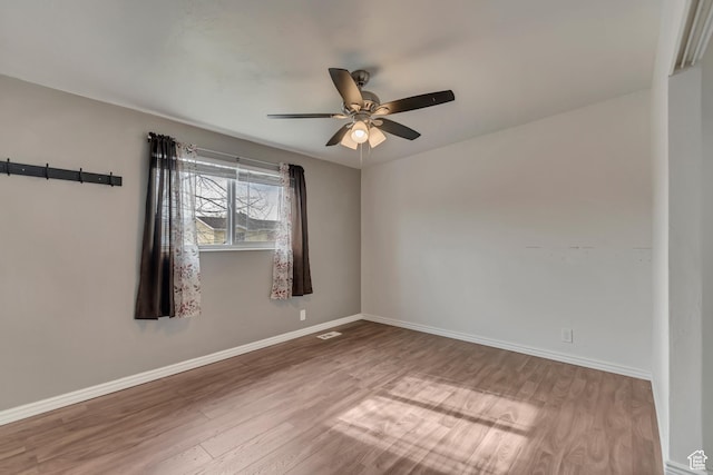 8729 S 3720 W, West Jordan, UT 84088 - unfurnished room with baseboards, ceiling fan, wood finished floors, and visible vents