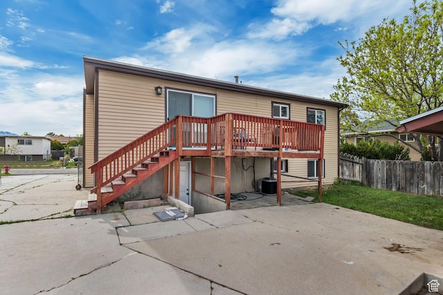 8729 S 3720 W, West Jordan, UT 84088 - back of house featuring fence, a patio, stairs, and a wooden deck
