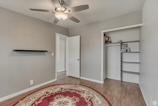 8729 S 3720 W, West Jordan, UT 84088 - unfurnished bedroom featuring baseboards, wood finished floors, and a closet