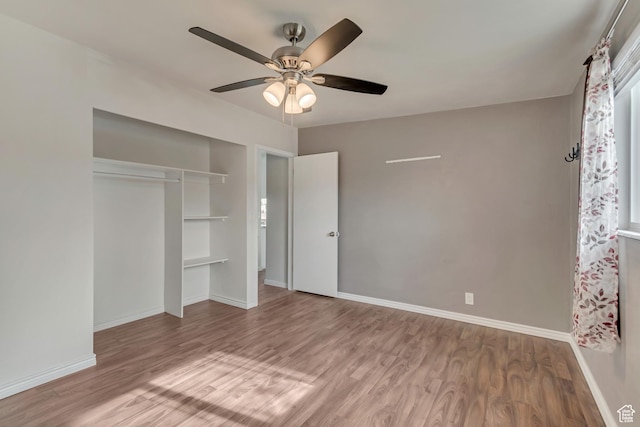 8729 S 3720 W, West Jordan, UT 84088 - unfurnished bedroom with baseboards, ceiling fan, wood finished floors, and a closet