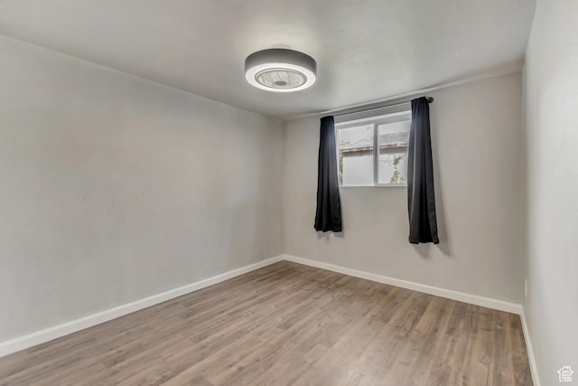 8729 S 3720 W, West Jordan, UT 84088 - unfurnished room with baseboards and wood finished floors