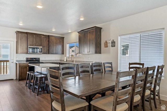 2242 S Beachcomber Ln, Garden City, UT 84028 - dining space with recessed lighting and dark wood-style floors
