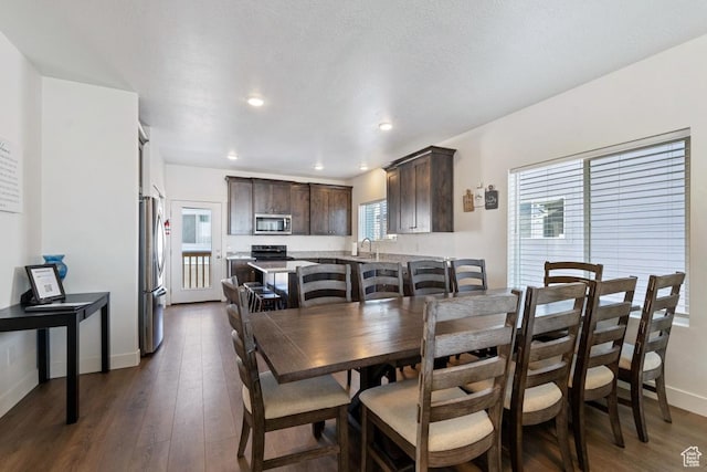 2242 S Beachcomber Ln, Garden City, UT 84028 - dining area with recessed lighting, baseboards, a wealth of natural light, and dark wood-type flooring
