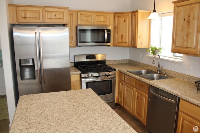 512 Stone Way, Santaquin, UT 84655 - kitchen featuring pendant lighting, appliances with stainless steel finishes, a sink, light countertops, and light brown cabinets