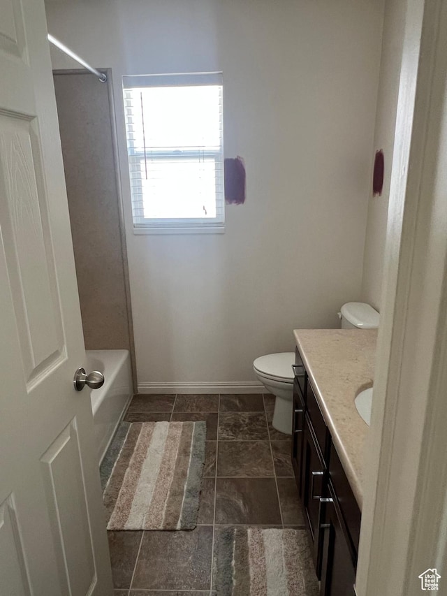 1013 N 740 W, Centerville, UT 84014 - bathroom with vanity, baseboards, toilet, and shower / bathing tub combination